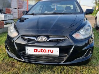 2013 Hyundai Solaris I, чёрный, 700000 рублей, вид 1