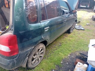 2000 Mazda Demio I (DW), зелёный, 280000 рублей, вид 1