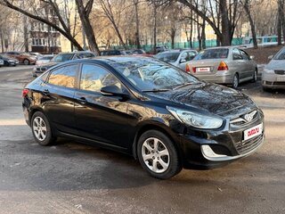 2011 Hyundai Solaris I, чёрный, 650000 рублей, вид 3