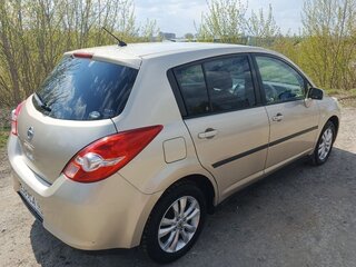 2009 Nissan Tiida I, золотистый, 620000 рублей, вид 4