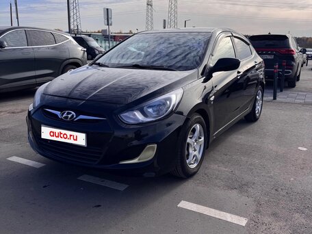 2012 Hyundai Solaris I, чёрный, 630000 рублей, вид 1