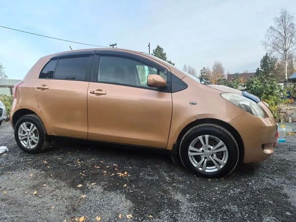 2005 Toyota Vitz II (XP90), оранжевый, 510000 рублей - вид 6