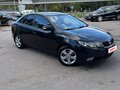 2010 Kia Cerato 4-speed II, чёрный, 580000 рублей - вид 1