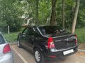 2011 Renault Logan I Рестайлинг, чёрный, 670000 рублей - вид 1