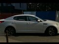 2014 Kia Optima III Рестайлинг, белый - вид 1