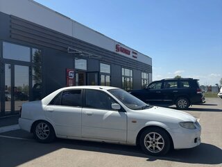 2001 Mazda Familia VIII (BJ), белый, 145000 рублей, вид 2