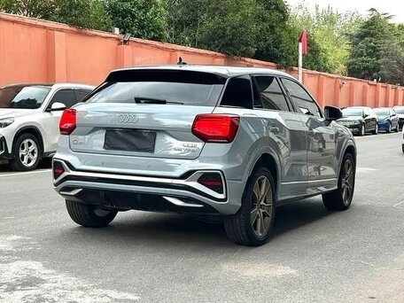 2023 Audi Q2 L 35 TFSI I Рестайлинг, серый, 2090000 рублей, вид 3