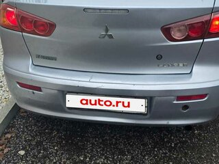 2009 Mitsubishi Lancer X, серебристый, 550000 рублей, вид 2