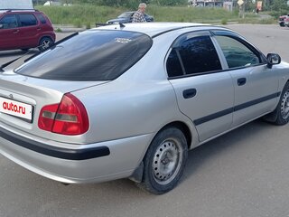 2002 Mitsubishi Carisma I Рестайлинг, серебристый, 320000 рублей, вид 4