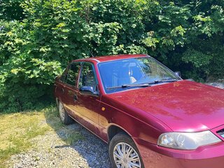 2010 Daewoo Nexia I Рестайлинг, пурпурный, 280000 рублей, вид 3