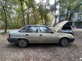 2005 Daewoo Nexia I, коричневый - вид 1