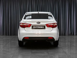 2014 Kia Rio 6-speed III, белый, 879000 рублей, вид 4