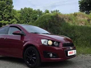 2014 Chevrolet Aveo II, красный, 900000 рублей, вид 1