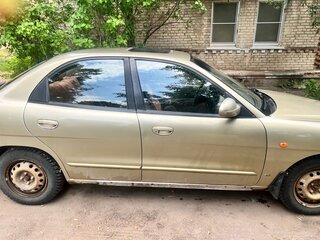 1999 Daewoo Nubira II, золотистый, 125000 рублей, вид 4