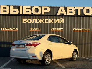 2014 Toyota Corolla XI (E160, E170, E180), белый, 1190000 рублей, вид 2