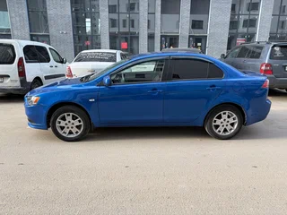2012 Mitsubishi Lancer X Рестайлинг, синий, 330000 рублей, вид 5