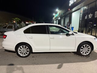 2016 Volkswagen Jetta VI Рестайлинг, белый, 1250000 рублей, вид 3