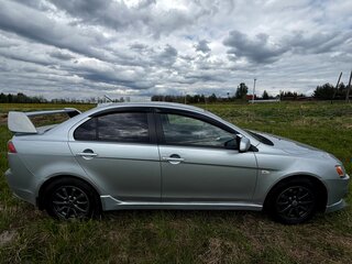 2012 Mitsubishi Lancer X Рестайлинг, серебристый, 650000 рублей, вид 4