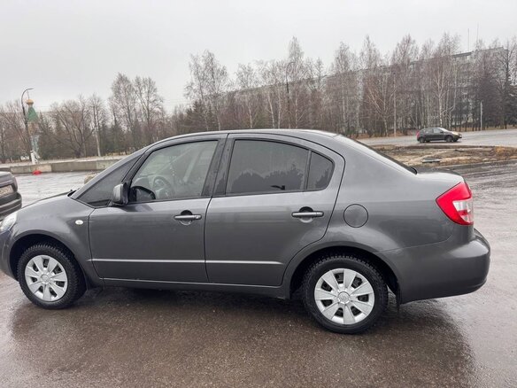 2010 Suzuki SX4 I (Classic) Рестайлинг, серый, 800000 рублей - вид 5