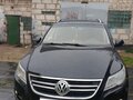 2011 Volkswagen Tiguan I, чёрный, 850000 рублей - вид 1