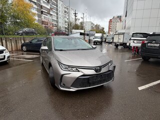 2022 Toyota Corolla XII (E210), коричневый, 1500000 рублей, вид 2