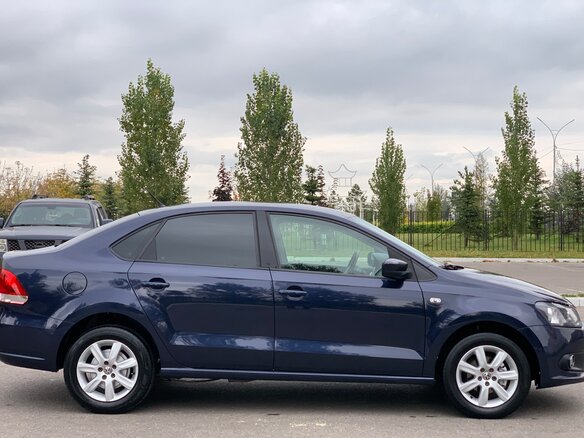 2012 Volkswagen Polo V, синий - вид 4