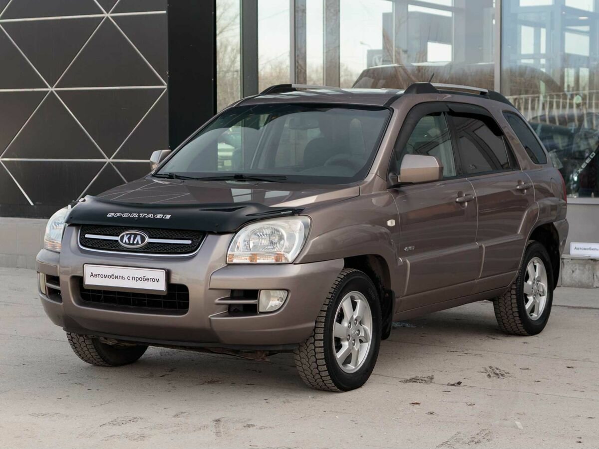 Открыть фотографии: Kia Sportage II