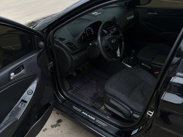 2014 Hyundai Solaris I, чёрный, 800000 рублей - вид 10