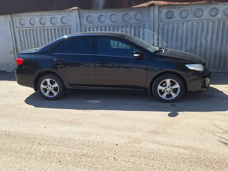 2012 Toyota Corolla X (E140, E150) Рестайлинг, чёрный, 950000 рублей, вид 2