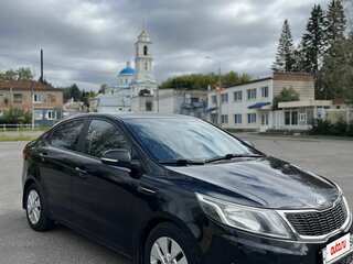 2013 Kia Rio 4-speed III, чёрный, 715000 рублей, вид 2