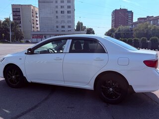 2010 Toyota Corolla X (E140, E150), белый, 955000 рублей, вид 3