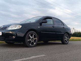 2006 Toyota Corolla IX (E120, E130) Рестайлинг, чёрный, 650000 рублей, вид 1