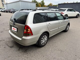 2004 Toyota Corolla IX (E120, E130), серебристый, 570000 рублей, вид 2