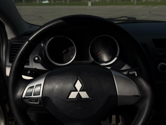 2012 Mitsubishi Lancer X Рестайлинг, серебристый, 850000 рублей - вид 11