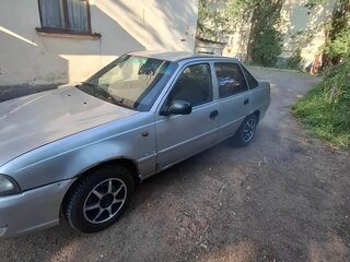 2010 Daewoo Nexia I Рестайлинг, серебристый, 80000 рублей, вид 4