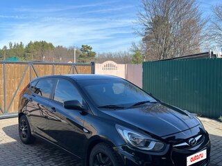 2013 Hyundai Solaris I, чёрный, 700000 рублей, вид 3