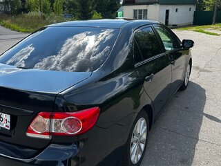 2010 Toyota Corolla X (E140, E150) Рестайлинг, чёрный, 850000 рублей, вид 3