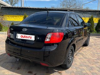 2010 Kia Rio II Рестайлинг, чёрный, 480000 рублей, вид 1