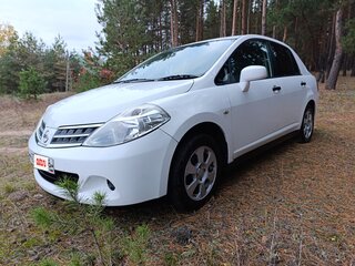 2010 Nissan Tiida I Рестайлинг, белый, 825000 рублей, вид 1