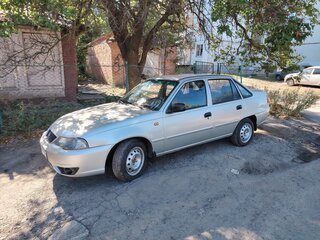 2011 Daewoo Nexia I Рестайлинг, серебристый, 230000 рублей, вид 2