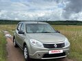 2013 Renault Sandero I, бежевый, 620000 рублей