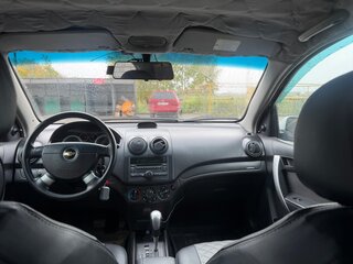2011 Chevrolet Aveo I Рестайлинг, белый, 680000 рублей, вид 4
