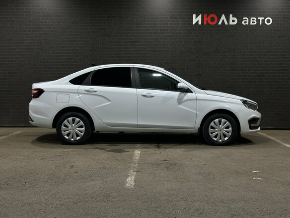 2023 Lada (ВАЗ) Vesta I Рестайлинг (NG), белый - вид 3
