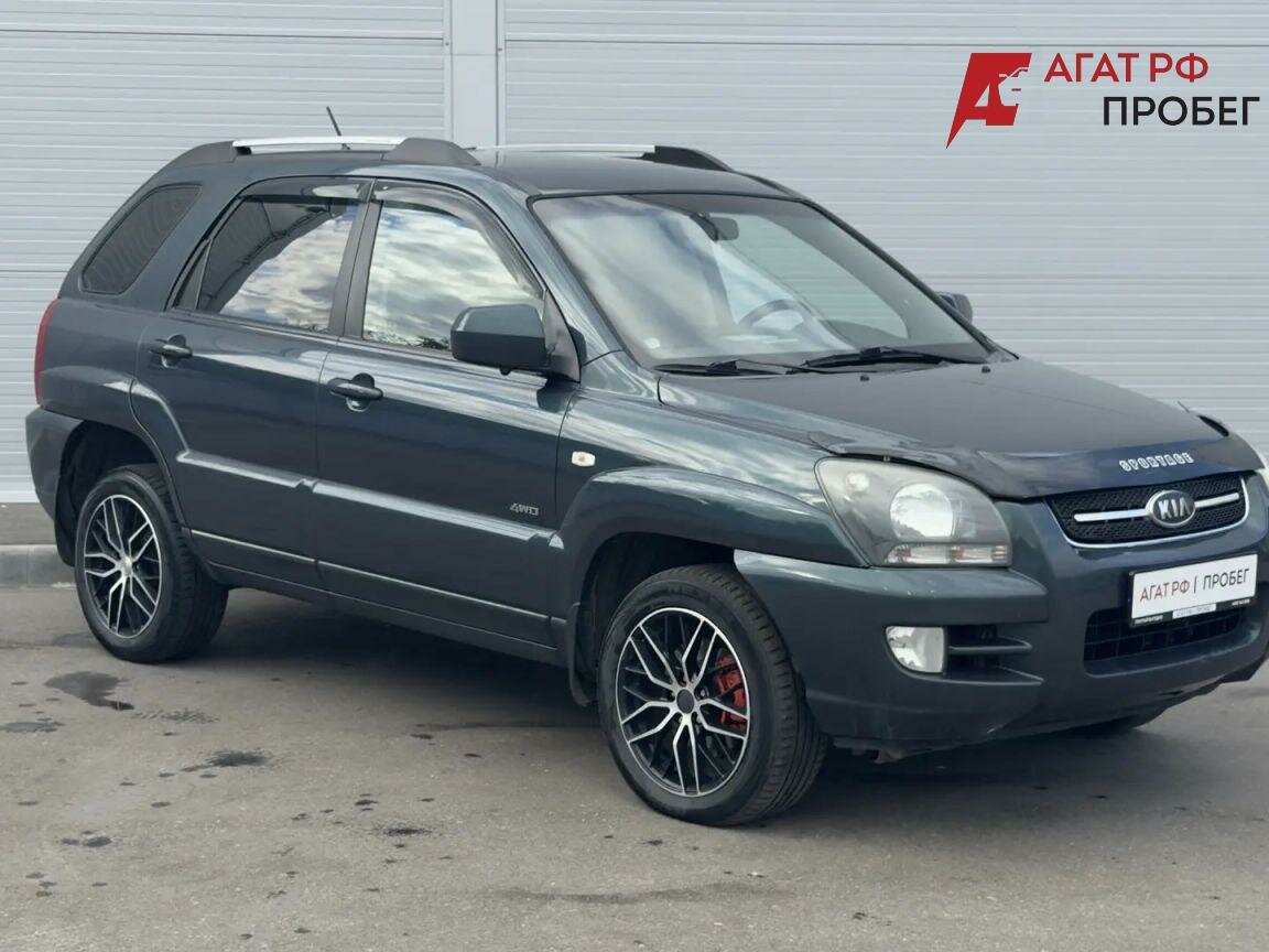 Открыть фотографии: Kia Sportage II
