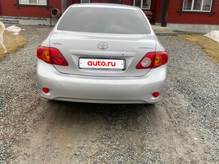 2007 Toyota Corolla X (E140, E150), серебристый, 650000 рублей, вид 2