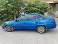 2010 Daewoo Nexia I Рестайлинг, синий, 180000 рублей - вид 1