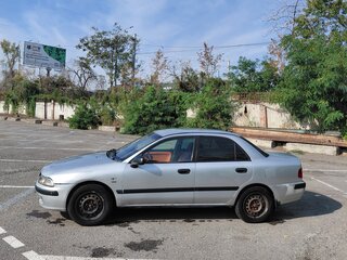 1999 Mitsubishi Carisma I Рестайлинг, серебристый, 230000 рублей, вид 4