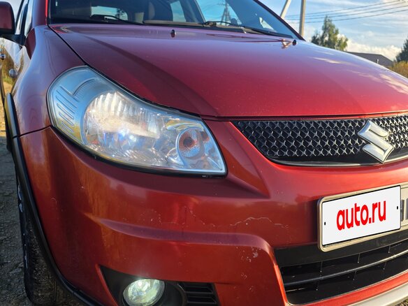 2010 Suzuki SX4 I (Classic) Рестайлинг, оранжевый, 645000 рублей - вид 15