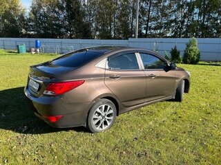 2014 Hyundai Solaris I Рестайлинг, коричневый, 999000 рублей, вид 3