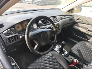 2005 Mitsubishi Lancer IX Рестайлинг, серебристый, 135000 рублей, вид 4
